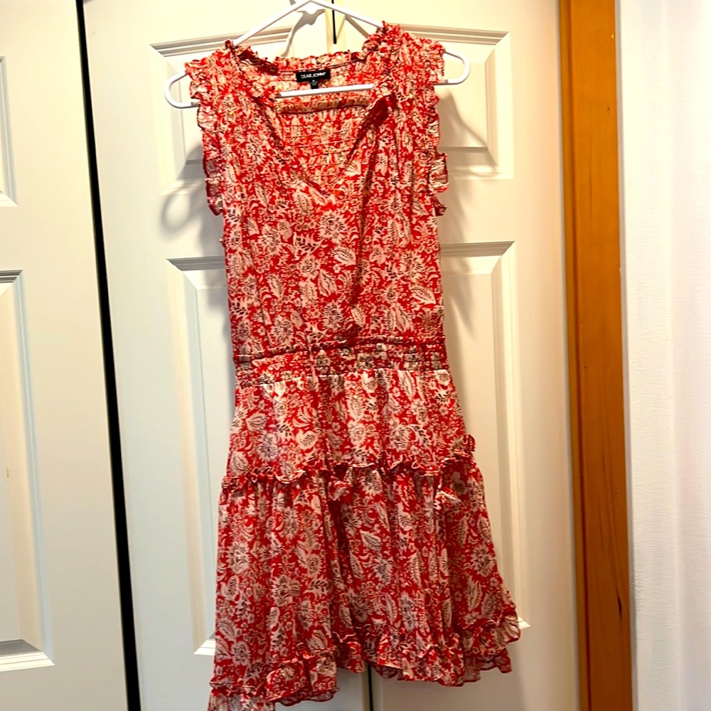 Cute sleeveless red, cream and burgundy dress with lined skirt, never worn